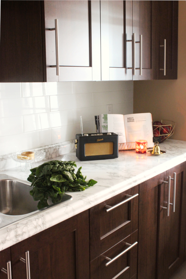 Save Kitchen Countertop Space With These Command Strip Paper Towel Hacks